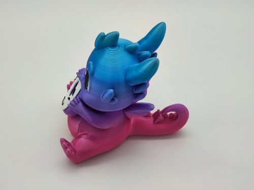 Baby-Drachenfigur mit Donut