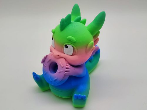 Baby-Drachenfigur mit Donut